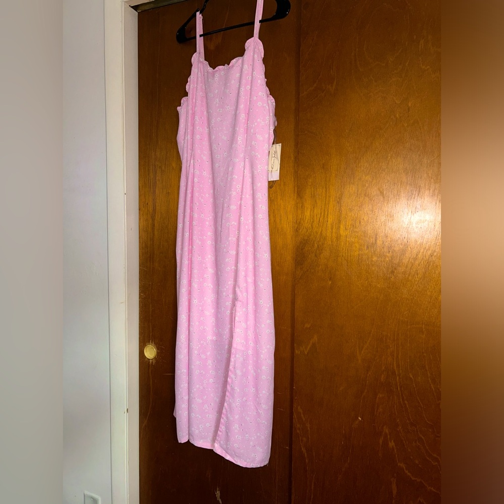 Brand new with tags cute & flirty summer dress! PET & SMOKE FREE HOME!